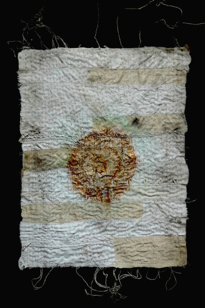 stitched and aged textile
